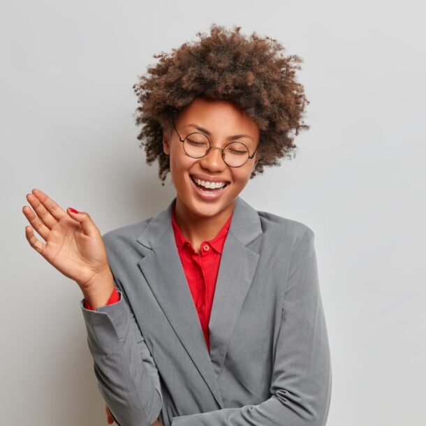 overjoyed-successful-female-entrepreneur-laughs-fr-6B29NRG